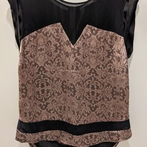 New,Beautiful short sleeve blouse. No tags.